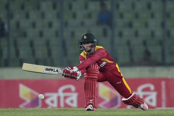 Zimbabwe cricketer Sean Williams plays a shot during the third one-day international (ODI) match between Bangladesh and Zimbabwe at the Sher-e Bangla National Stadium in Dhaka on November 11, 2015. AFP PHOTO/ Munir uz ZAMAN (Photo credit should read MUNIR UZ ZAMAN/AFP/Getty Images)