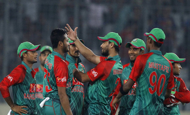 Bangladesh’s Shakib Al Hasan, second left, celebrates with teammates the dismissal of Zimbabwe’s Craig Ervine during their first one day international cricket match in Dhaka, Bangladesh, Saturday, Nov. 7, 2015. (AP Photo/A.M. Ahad)