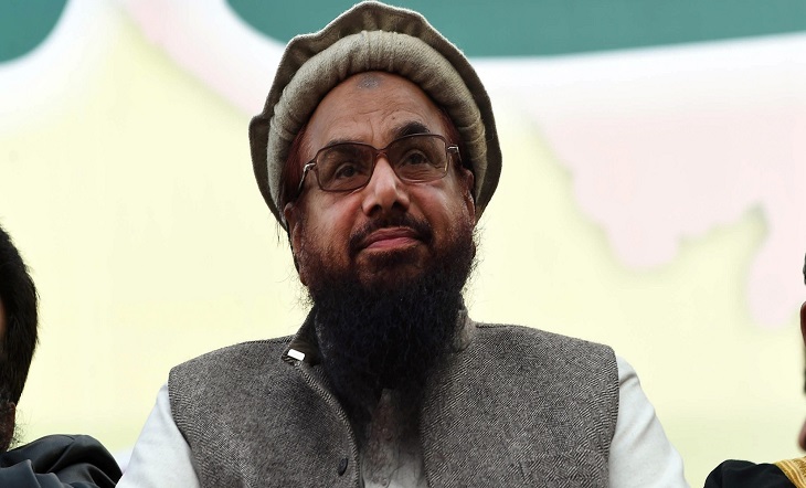 Hafiz Muhammad Saeed (C), head of the banned Pakistani charity organisation, Jamaat-ud-Dawa (JuD) attends a protest to mark Kashmir Solidarity day in Lahore on February 5, 2015. Pakistan observed Kashmir Solidarity Day on February 5 to denounce Indian rule in the disputed Himalayan region, claimed in whole by both countries.  AFP PHOTO / ARIF ALI        (Photo credit should read Arif Ali/AFP/Getty Images)